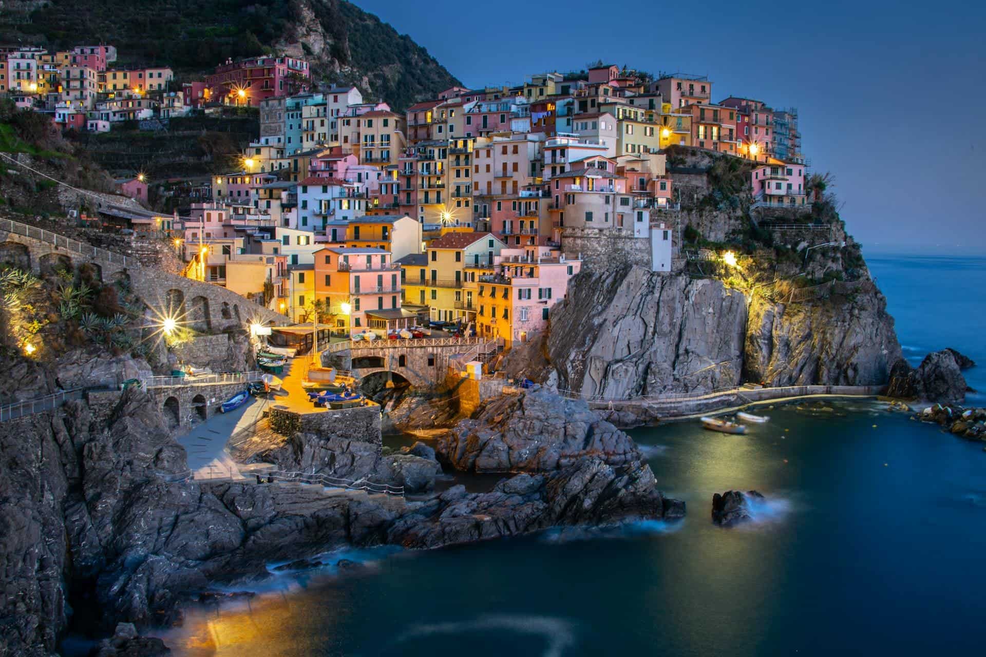 Hotels on the Italian Riviera, Italy — Genoa maritime heritage, old-town streets, waterfront areas, museums, galleries, and northern Italy coastal city breaks